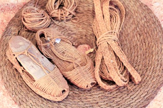 Espadrilles made of esparto grass for sale in a basket