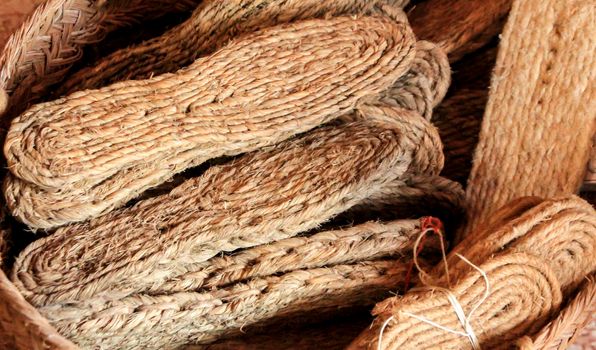 Espadrilles made of esparto grass for sale in a basket