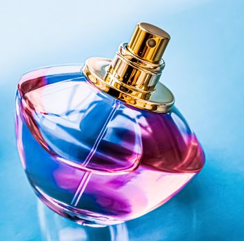 Perfume bottle on glossy background, sweet floral scent, glamour fragrance and eau de parfum as holiday gift and luxury beauty cosmetics brand design.