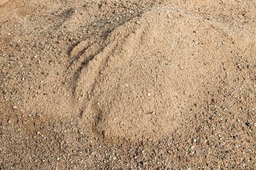 A pile of sand. Natural sand texture close-up as background.