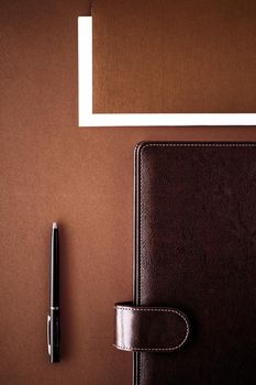 Productivity, work and corporate lifestyle concept - Vintage business briefcase on the office table desk, flatlay background