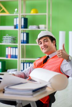 Man architect working on the project