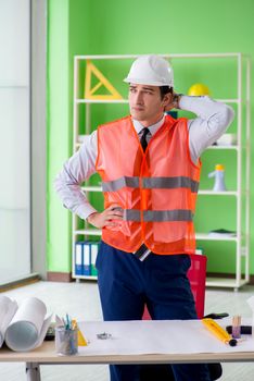 Man architect working on the project