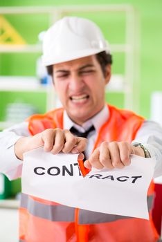Angry construction supervisor cancelling contract 