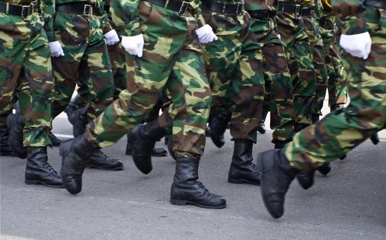 Soldiers march in formation 