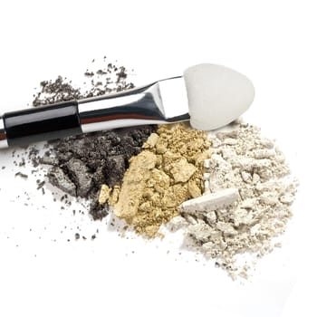 Make-up brush with colorful crushed eyeshadows