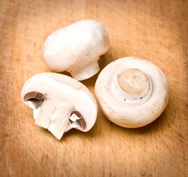 Fresh mushrooms on a wooden board