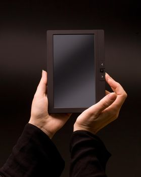 Woman hands holding electronic tablet pc