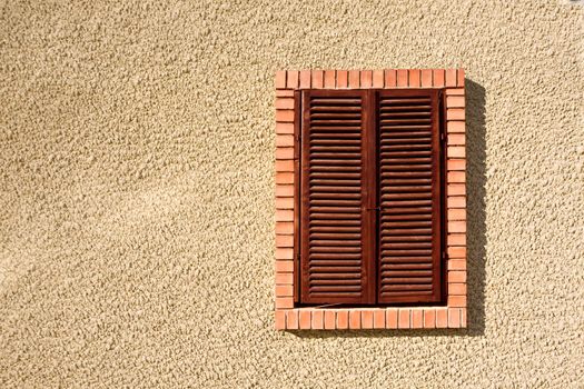 Closed old wooden window shutters