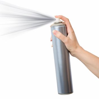 young female hand spraying an aerosol can