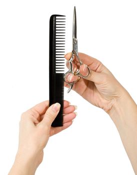 hands of hairdresser with tools isolated