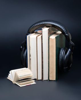 headphones and books (audio book concept)