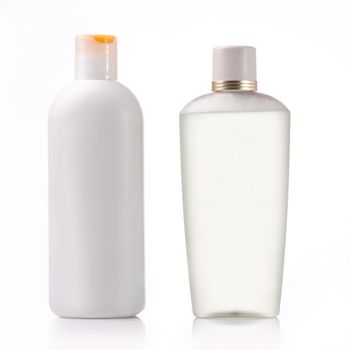 Two containers of cosmetic isolated on white.