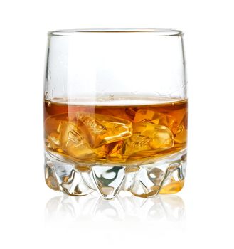 Whisky glass and ice isolated on white background