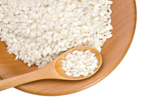 wooden plate with white  grains of rice on a white background with clipping paths