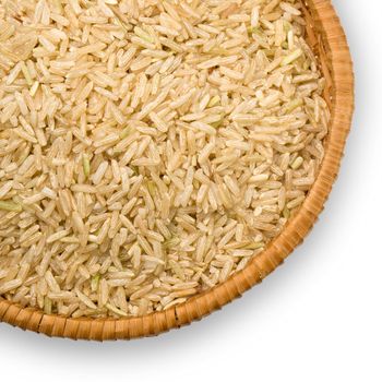 straw plate with brown rice in Thai on a white background