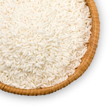 straw plate of white rice on a white background