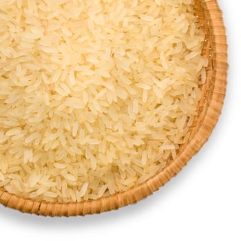 straw plate of long grain rice on a white background