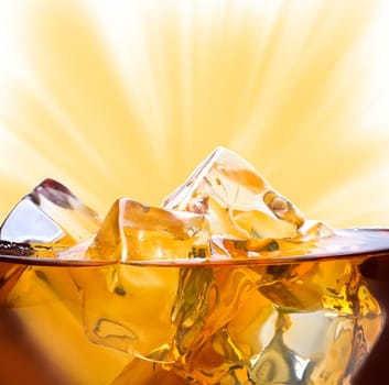 Whiskey with ice background