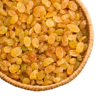 straw dish with raisins on a white background keeping paths