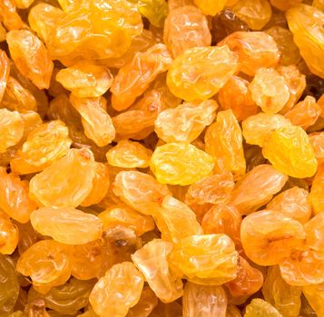 Golden raisins close-up background