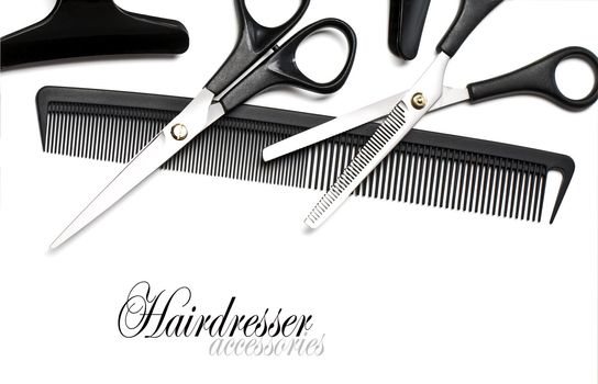 Scissors and Comb for hair isolated on white