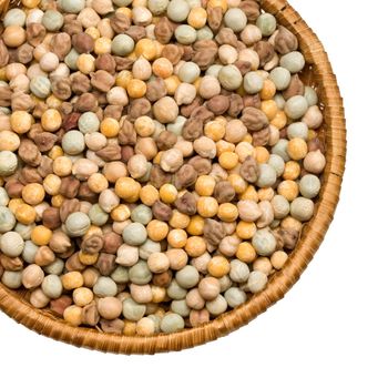 straw plate with a variety of beans on white background