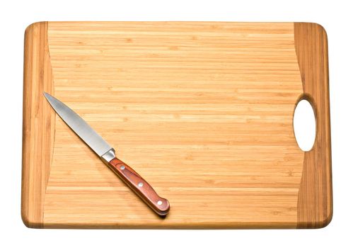 Knife on cutting board isolated on white