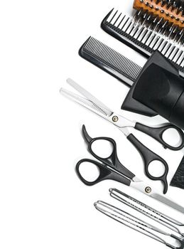 hairdresser scissors, combs and brush on white background