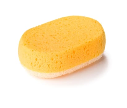 close-up of yellow sponge on a white background