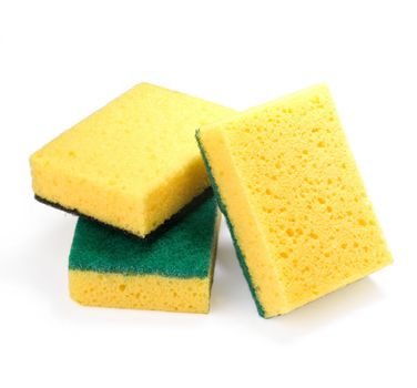 Yellow sponges for washing utensils on a white background