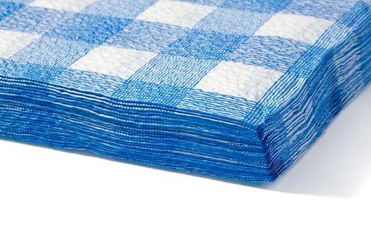 a stack of white cloth in a blue cell close-up on white background