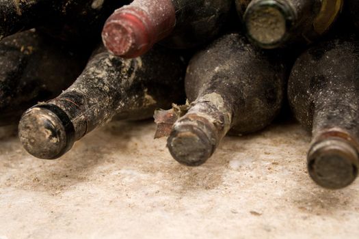 vineyard cellar with old bottles