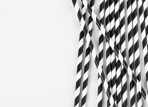 Background of Striped drink straws with copy space