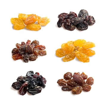 different varieties of raisins on a white background