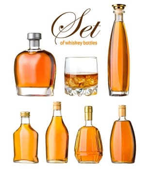 set of whiskey bottles and glass isolated