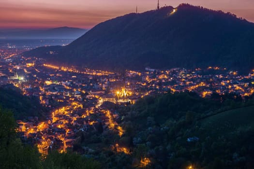 Aerial panorama of Brasov at dawn. Brasov, Brasov County, Romania.
