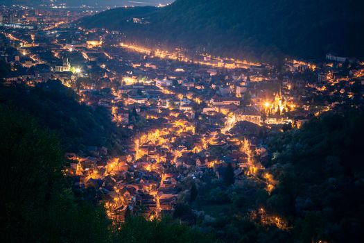 Aerial panorama of Brasov at dawn. Brasov, Brasov County, Romania.