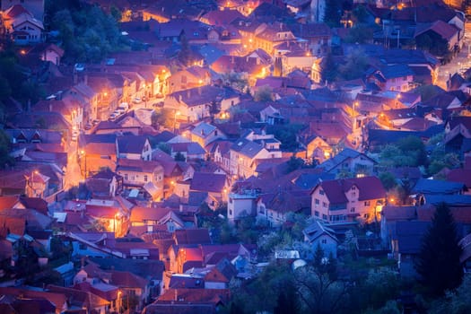 Aerial panorama of Brasov at dawn. Brasov, Brasov County, Romania.
