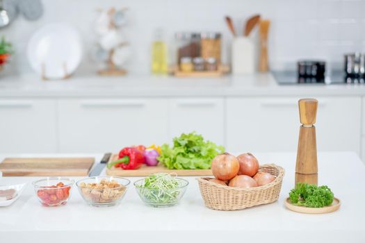 Different types and kinds of ingredient and food are placed on table in kitchen. Concept of healthy food for family and prepare at home.