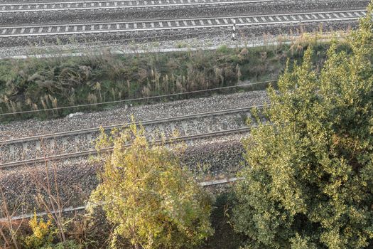 Aerial view of train tracks. Top view of railway station.