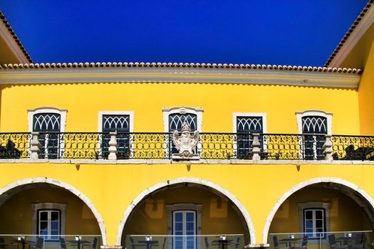 Narrow and colorful streets, majestic facades, windows and balconies of Lisbon, Portugal