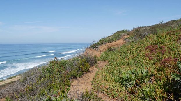 Seascape vista point, viewpoint in Del Mar near Torrey Pines, California coast USA. Frome above panoramic ocean tide, blue sea waves, steep eroded cliff. Coastline overlook, shoreline high angle view