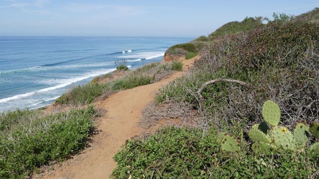 Seascape vista point, viewpoint in Del Mar near Torrey Pines, California coast USA. Frome above panoramic ocean tide, blue sea waves, steep eroded cliff. Coastline overlook, shoreline high angle view