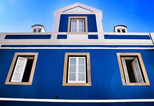 Narrow and colorful streets, majestic facades, windows and balconies of Lisbon, Portugal