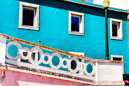 Narrow and colorful streets, majestic facades, windows and balconies of Lisbon, Portugal
