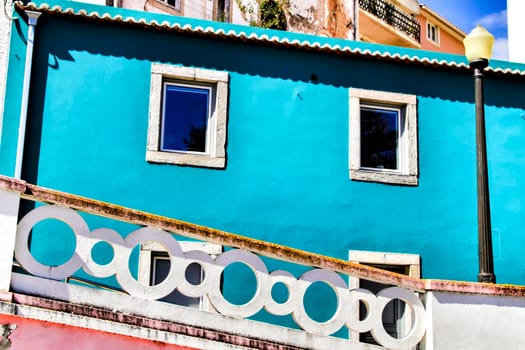 Narrow and colorful streets, majestic facades, windows and balconies of Lisbon, Portugal