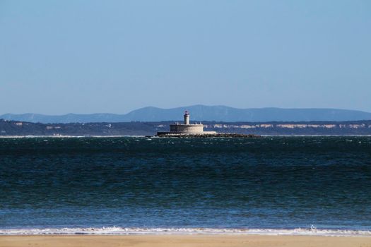 Beautiful beach called Praia da Torre in Lisbon, Portugal, in a sunny day of Spring