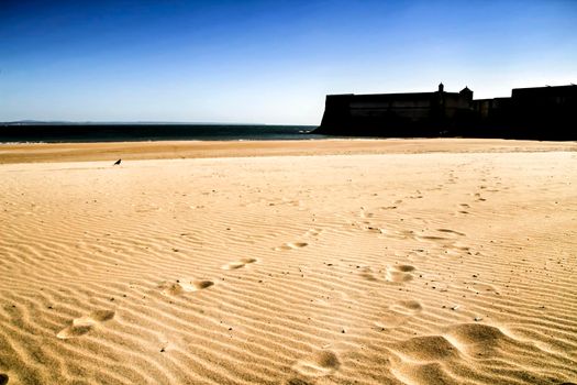 Beautiful beach called Praia da Torre in Lisbon, Portugal, in a sunny day of Spring