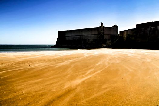 Beautiful beach called Praia da Torre in Lisbon, Portugal, in a sunny day of Spring